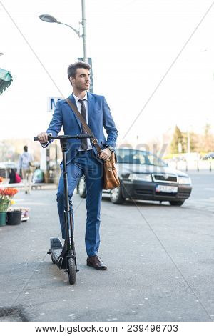 Bucharest, Romania, - Octomber 26, 2017: Using Electric Scooter On The Street On A Sunny Day With Sa
