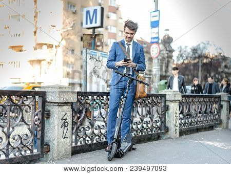 Bucharest, Romania, - Octomber 26, 2017: Using Electric Scooter On The Street On A Sunny Day With Sa