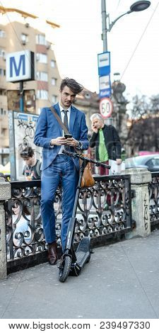 Bucharest, Romania, - Octomber 26, 2017: Using Electric Scooter On The Street On A Sunny Day With Sa