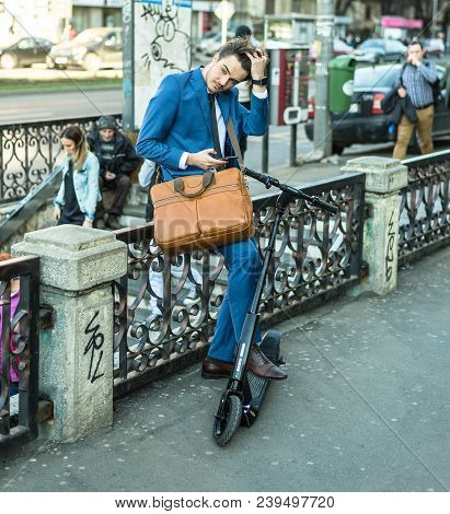 Bucharest, Romania, - Octomber 26, 2017: Using Electric Scooter On The Street On A Sunny Day With Sa