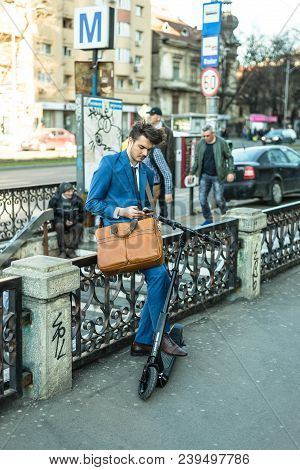 Bucharest, Romania, - Octomber 26, 2017: Using Electric Scooter On The Street On A Sunny Day With Sa