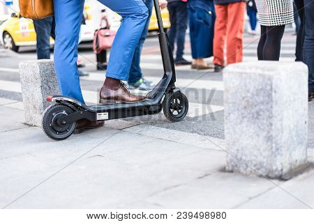 Bucharest, Romania, - Octomber 26, 2017: Using Electric Scooter On The Street On A Sunny Day With Sa