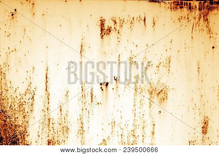 Grungy Rusted Metal Surface In Orange Tone. Abstract Background And Texture.