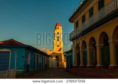 Trinidad, Cuba. The Bell Tower Of San Francisco De Asis. Street In The Center Of The Cuban City.