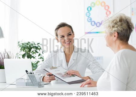 Smiling Dietician With Her Patient