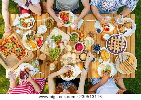 Friends Eating Healthy Food Outdoors