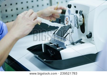 Rotary Microtome Section For Diagnosis In Pathology Make Microscope Slide Histology. Human Tissue Eq