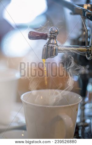 Close Up Of Siphon Vacuum, Coffee Cup And Siphon Vacuum Coffee Maker At Shop.