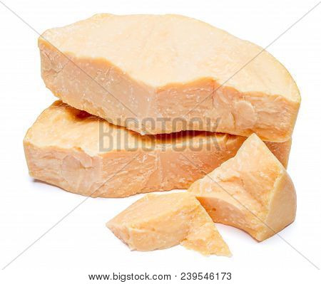 Pieces Of Parmesan Or Parmigiano Hard Cheese Isolated On White Background