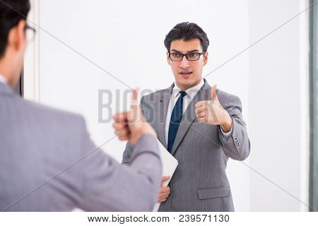 Politician planning speach in front of mirror