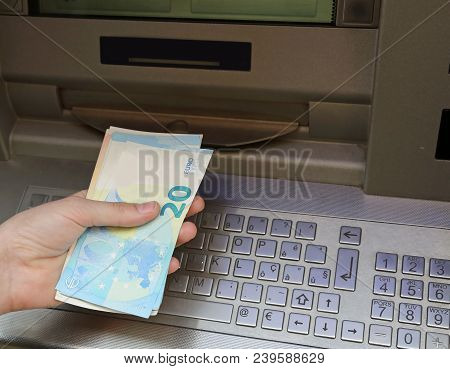 Atm Machine And European Banknotes On The Hand Of Boy