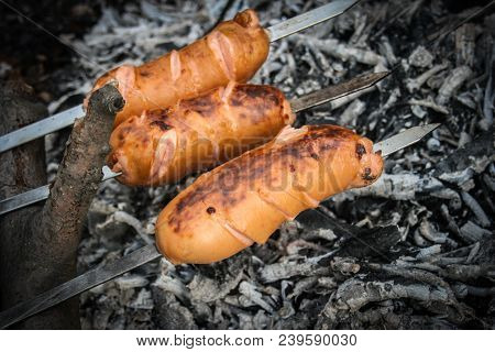 Bbq Grill. Rest Time. Sausage On The Grill