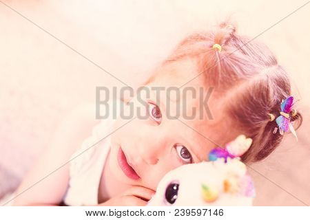 Tle Girl With Her Toy In Cute Pink Tutu.