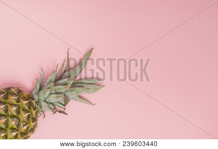 Half Cut Juicy Pineapple On A Pastel Pink Background. Minimal Summer Concept.