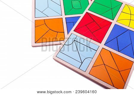Educational Ecological Wooden Toys For Children. Red, Yellow, Pink, Blue Geometric Figures Isolated 