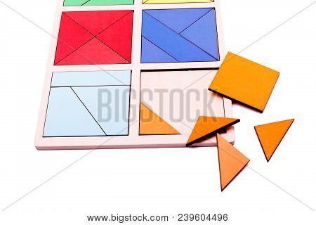 Educational Ecological Wooden Toys For Children. Red, Yellow, Pink, Blue Geometric Figures Isolated 