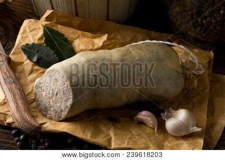 German Specialty Liverwurst (leberwurst) With Spices On Wooden Table In Kitchen