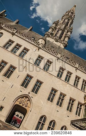 City Hall Building And Its Gothic Tower Intentionally Crooked At The Grand Place Of Brussels. Vibran