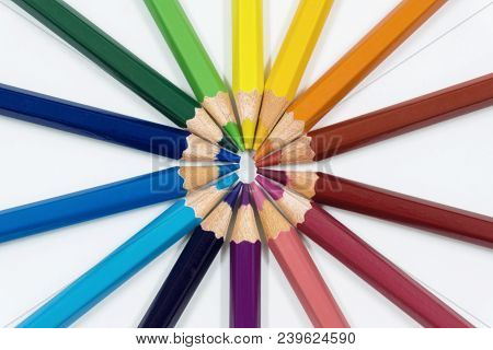 Color Pencils Isolated On White Arranged In Circle. Close Up.