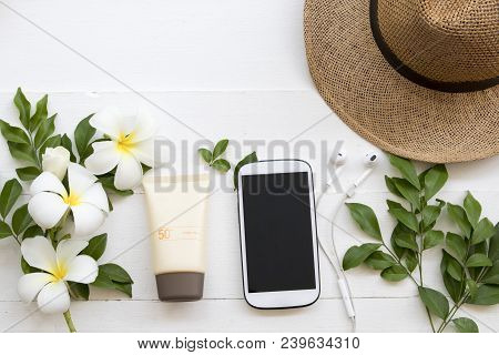 Natural Cosmetic For Skin Face Sunscreen Spf50 Mobile Phone And Hat Of Lifestyle Woman Relax Summer