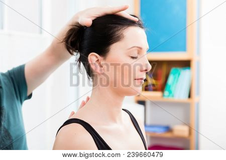 Orthopaedist checking stance of patient for physiotherapy