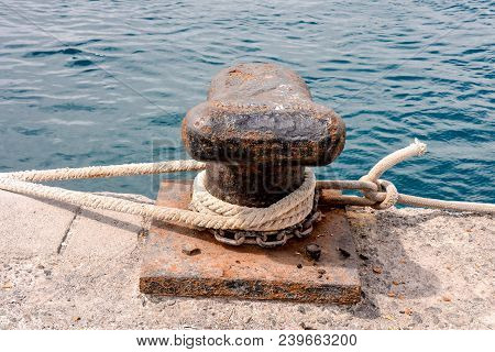 Photo Picture Of A Rusty Metal Mooring Bolard For Big Ship