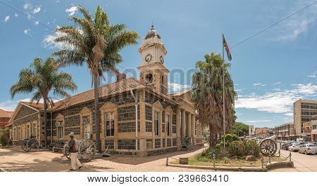 Ladysmith, South Africa - March 21, 2018: A Street Scene, With The Historic Town Hall And Cannons Fr