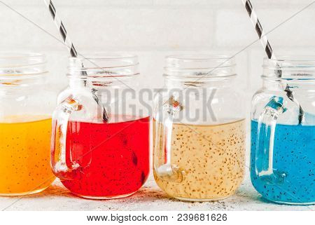 Set Of Different Chia Seed Drink, Tropical Fruit Cocktails,  Fresca, Grey Stone Background Copy Spac
