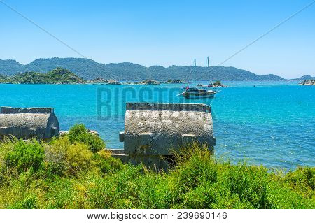 Kekova Is Famous For Preserved Archaeological Landmarks, Such As Sunken City Or Lycian Necropolis Wi