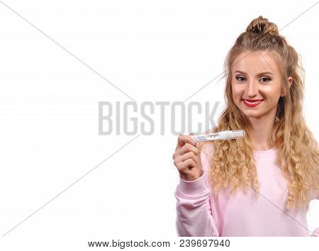 Happy Woman Showing A Positive Pregnancy Test