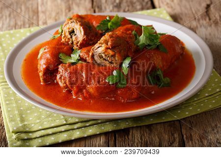 Italian Bracilole: Tender Beef Stuffed With Parsley And Parmesan Cheese In Tomato Sauce Close-up. Ho