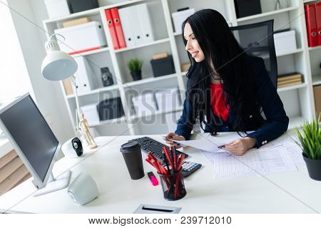 Portrait Of A Young Girl In A Suit. Beautiful Girl Is Working In The Office.