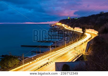 Aerial Dusk View Of The Sea And Kurortny Prospekt With Light Trails, Sochi, Russia