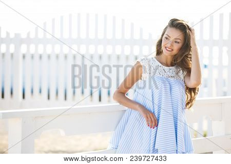 Young Beautiful Smiling Woman. Оutdoor Portrait. Summer