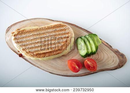 Turkish Sandwich Toast (tost) With Cheddar Or Melted Cheese On Wooden Background ,top View