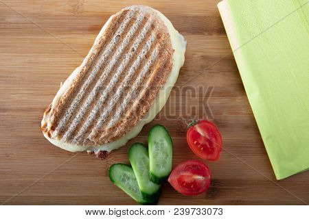 Turkish Sandwich Toast (tost) With Cheddar Or Melted Cheese With Napkin On Wooden Background ,top Vi