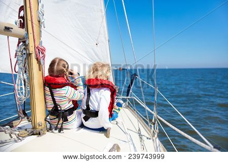 Kids Sail On Yacht In Sea. Child Sailing On Boat.