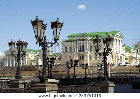 Yekaterinburg, Russia - May 02, 2018: View Through A Gallery With Retro Lanterns On A Historic Build