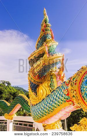 A Very Beautiful Naga (a Very Great Serpent) Statue Surrounding The Pagoda At Doi Thepnimit Temple O
