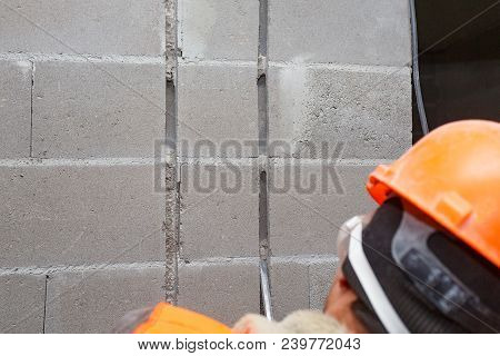 Slotting Of The Wall Under The Wiring With A Perforator.
