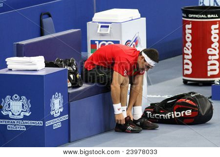 BUKIT JALIL, Malezya-Ekim 01: Kıbrıs Marco Baghdatis onun Malezya açık yarı final için hazır hale getirilir 