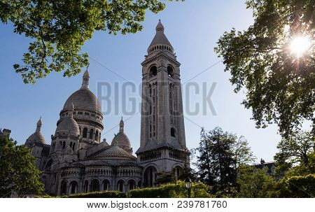 The Basilica Sacre Coeur Is A Roman Catholic Church Located At The Summet Of The Butte Montmartre , 