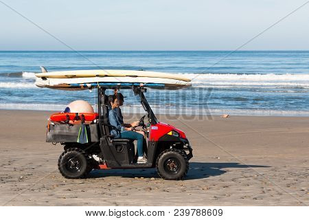 Solana Beach, California/usa - April 22, 2018:  Lifeguard Personnel Transport Surfboards And Other L