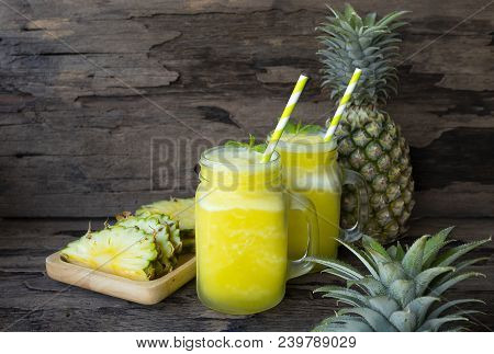 Pineapple Smoothie Juice Yellow Drink In The Morning Healthy On Wood Background.