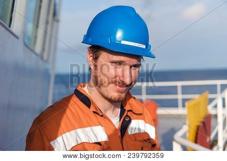 Marine Deck Officer Or Chief Mate On Deck Of Vessel Or Ship , Wearing Ppe Personal Protective Equipm