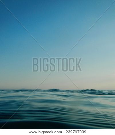 Horizon Meets Water, Ocean Rippled Water Meets Sky, Seascape Of Calm Water Clear Sky, Cloudless Blue