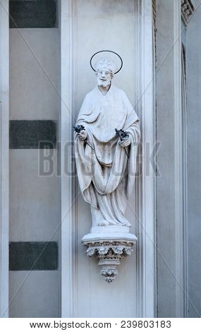 ROME, ITALY - SEPTEMBER 02: Statue of St. Patrick on the facade of Sacro Cuore del Suffragio church in Rome, Italy  on September 02, 2016.