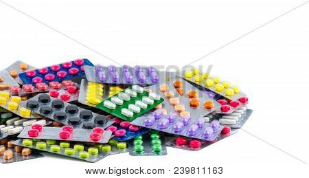 Pile Of Beautiful And Colorful Pills In Blister Pack Isolated On White Background. Health And Medici
