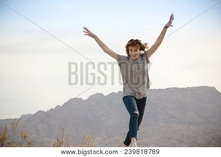 Girl Have Fun In Desert In A Summer Day