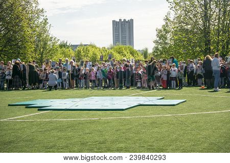 Russia. Moscow, May,07.18: School Stadium Is Full Of Kids On The Special Public Kindergarten Action 